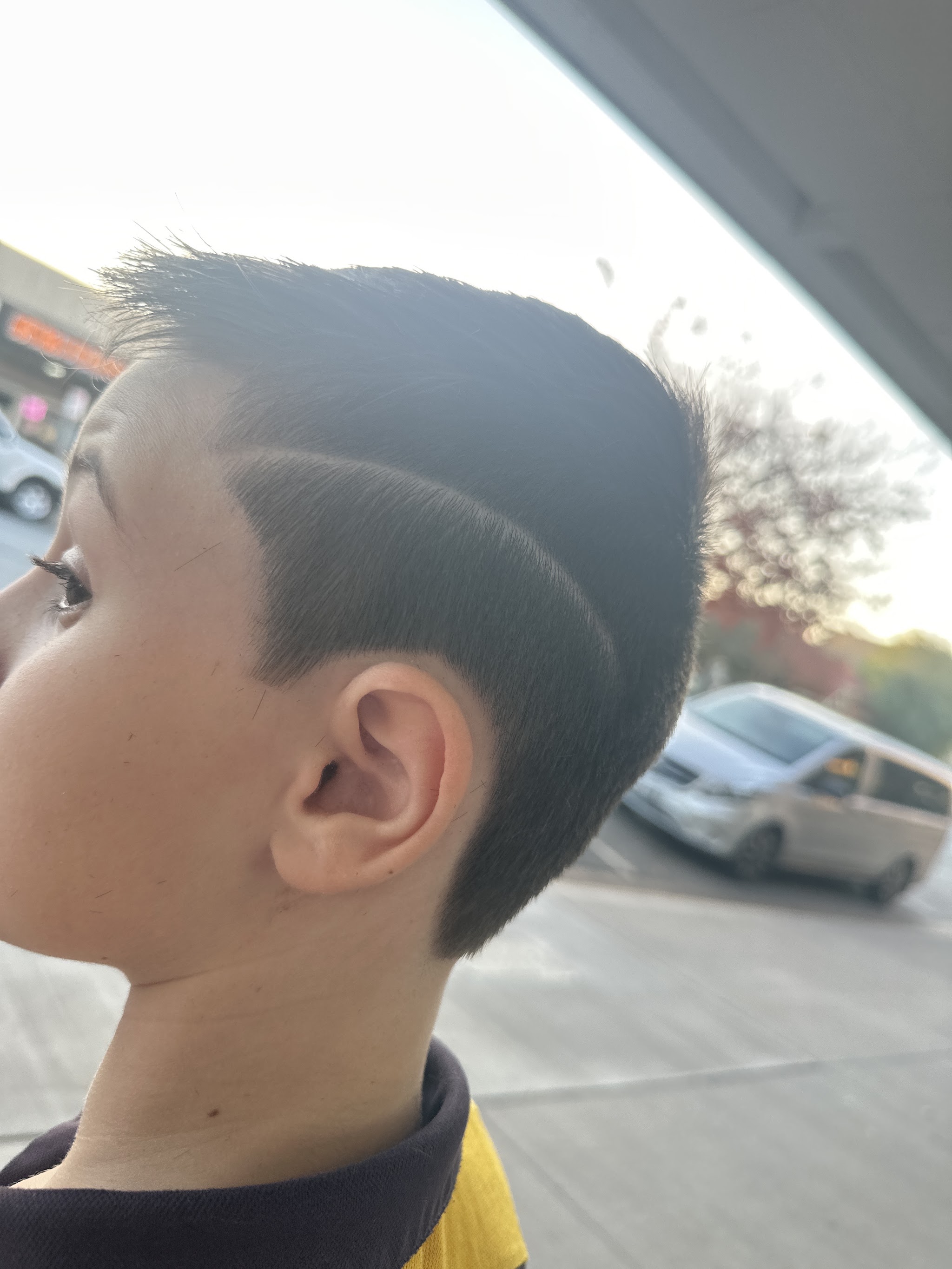 A textured crop with a shaved hard part